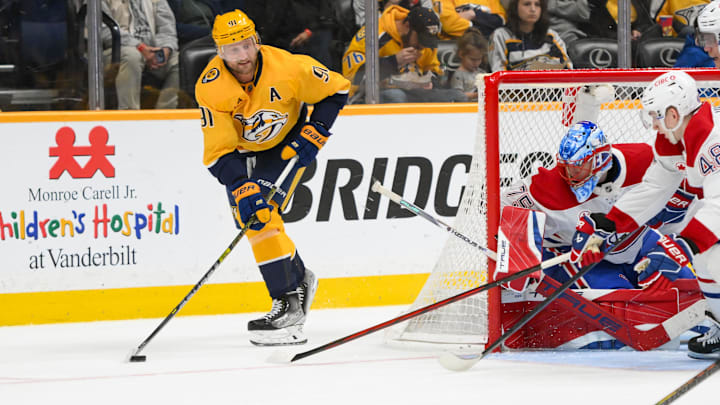 Apr 6, 2025; Nashville, Tennessee, USA;  Nashville Predators center Steven Stamkos (91) skates behind the net against the Montreal Canadiens during the second period at Bridgestone Arena. Mandatory Credit: Steve Roberts-Imagn Images