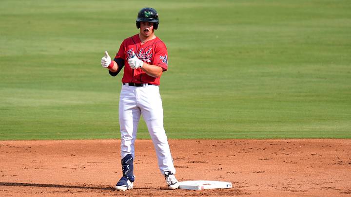 GreenJackets outfielder Carter Beck (17) gives a thumbs up to the dugout during the Augusta GreenJackets and Charleston RiverDogs baseball game at SRP Park in North Augusta, S.C., on Saturday, Aug. 15, 2026. The GreenJackets hosted Pavos Salvajes de Augusta Night to honor the local Hispanic communities.