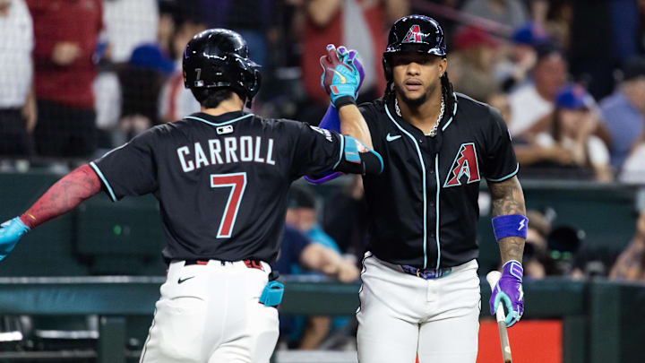 May 5, 2025; Phoenix, Arizona, USA; Arizona Diamondbacks outfielder Corbin Carroll (7) celebrates with Ketel Marte after hitting a home run in the first inning against the New York Mets at Chase Field. Mandatory Credit: Mark J. Rebilas-Imagn Images May 5, 2025; Phoenix, Arizona, USA; Arizona Diamondbacks outfielder Corbin Carroll (7) celebrates with Ketel Marte after hitting a home run in the first inning against the New York Mets at Chase Field. Mandatory Credit: Mark J. Rebilas-Imagn Images