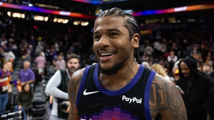 Feb 21, 2026; Phoenix, Arizona, USA; Phoenix Suns guard Jalen Green (4) celebrates after defeating the Orlando Magic in double overtime at Mortgage Matchup Center. Mandatory Credit: Mark J. Rebilas-Imagn Images