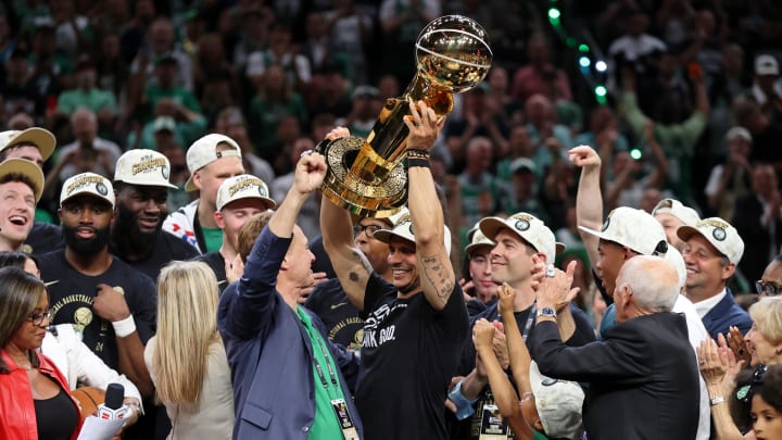 Jun 17, 2024; Boston, Massachusetts, USA; Boston Celtics head coach Joe Mazzulla holds up the trophy as he celebrates after winning the 2024 NBA Finals against the Dallas Mavericks at TD Garden. Mandatory Credit: Peter Casey-USA TODAY Sports
