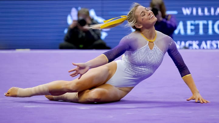 LSU Lady Tigers senior Livvy Dunne performs a floor routine against the Arkansas Razorbacks at Pete Maravich Assembly Center.