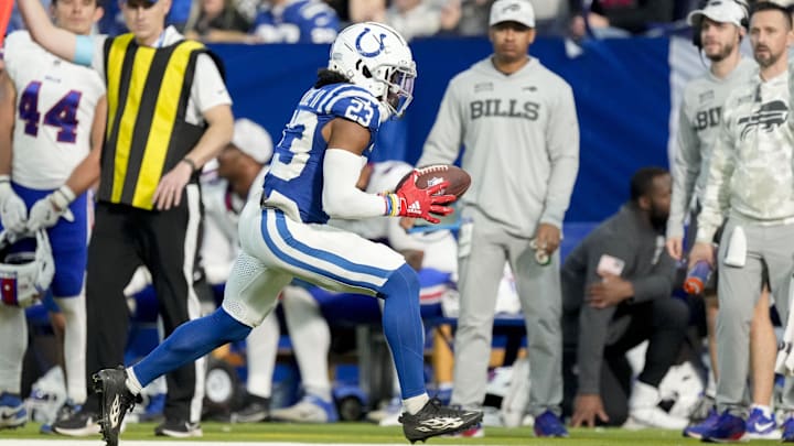 Indianapolis Colts cornerback Kenny Moore II intercepts a pass during a game against the Buffalo Bills at Lucas Oil Stadium.