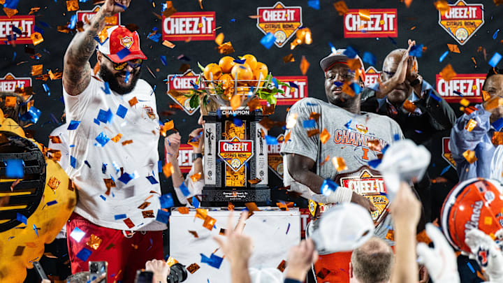 Dec 31, 2024; Orlando, FL, USA; Illinois Fighting Illini running back Josh McCray (6) celebrates winning the MVP after the game against the South Carolina Gamecocks at Camping World Stadium. Mandatory Credit: Jeremy Reper-Imagn Images