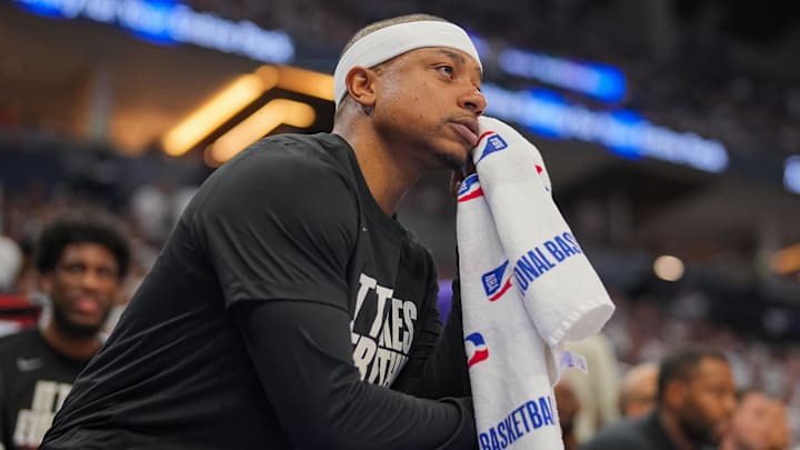 Ex-Husky guard Isaiah Thomas watches the Phoenix Suns face the Minnesota Timberwolves in the 2024 NBA playoffs.