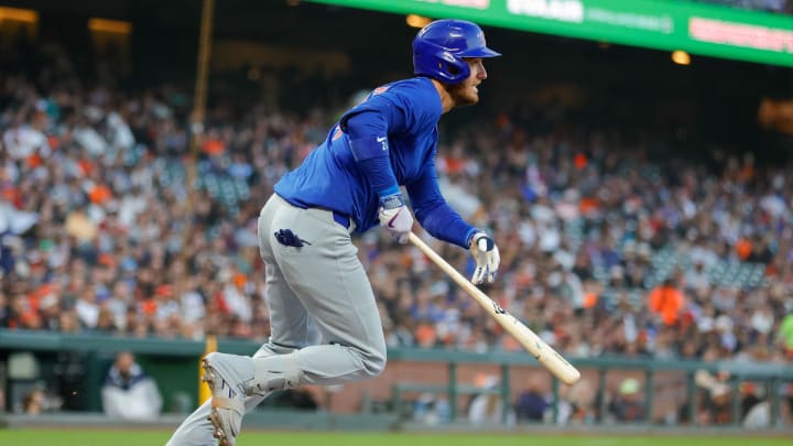 Jun 24, 2024; San Francisco, California, USA; Chicago Cubs outfielder Cody Bellinger (24) hits an RBI single during the fifth inning against the San Francisco Giants at Oracle Park. All Giants players wore the number 24 in honor of Giants former player Willie Mays. Mandatory Credit: Sergio Estrada-USA TODAY Sports
