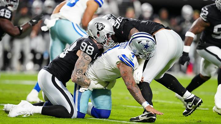 Las Vegas Raiders defensive end Maxx Crosby and Dallas Cowboys quarterback Dak Prescott Las Vegas Raiders defensive end Maxx Crosby and Dallas Cowboys quarterback Dak Prescott