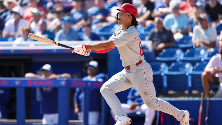Feb 26, 2025; Dunedin, Florida, USA; Philadelphia Phillies outfielder Gabriel Rincones Jr. (85) hits a solo home run against the Toronto Blue Jays in the third inning during spring training at TD Ballpark.