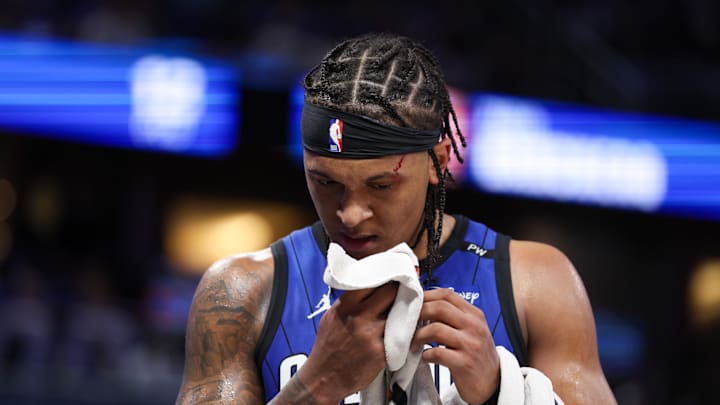 Apr 15, 2025; Orlando, Florida, USA; Orlando Magic forward Paolo Banchero (5) attends to a cut on his head against the Atlanta Hawks in the fourth quarter at Kia Center. Mandatory Credit: Nathan Ray Seebeck-Imagn Images Apr 15, 2025; Orlando, Florida, USA; Orlando Magic forward Paolo Banchero (5) attends to a cut on his head against the Atlanta Hawks in the fourth quarter at Kia Center. Mandatory Credit: Nathan Ray Seebeck-Imagn Images