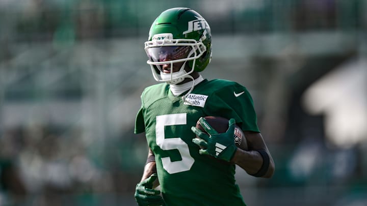 Jul 25, 2025; Florham Park, NJ, USA; New York Jets wide receiver Garrett Wilson (5) participates in a drill during training camp at Atlantic Health Jets Training Center. Mandatory Credit: John Jones-Imagn Images Jul 25, 2025; Florham Park, NJ, USA; New York Jets wide receiver Garrett Wilson (5) participates in a drill during training camp at Atlantic Health Jets Training Center. Mandatory Credit: John Jones-Imagn Images