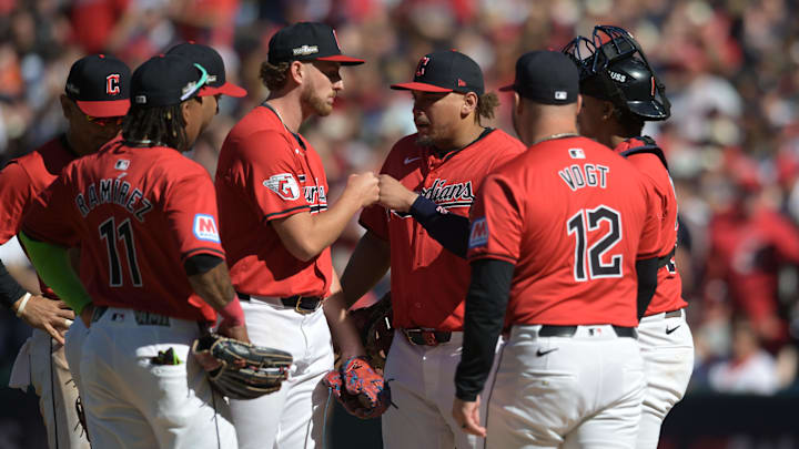 Oct 5, 2024; Cleveland, Ohio, USA; Cleveland Guardians pitcher Tanner Bibee (28) fist bumps Cleveland Guardians first baseman Josh Naylor (22) as he is relieved in the fifth inning against the Detroit Tigers in game one of the ALDS for the 2024 MLB Playoffs at Progressive Field. Mandatory Credit: Ken Blaze-Imagn Images