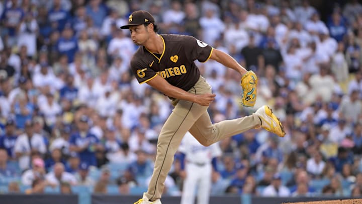 Oct 11, 2024; Los Angeles, California, USA; San Diego Padres pitcher Yu Darvish (11) pitches in the first inning against the Los Angeles Dodgers during game five of the NLDS for the 2024 MLB Playoffs at Dodger Stadium. Mandatory Credit: Jayne Kamin-Oncea-Imagn Images Oct 11, 2024; Los Angeles, California, USA; San Diego Padres pitcher Yu Darvish (11) pitches in the first inning against the Los Angeles Dodgers during game five of the NLDS for the 2024 MLB Playoffs at Dodger Stadium. Mandatory Credit: Jayne Kamin-Oncea-Imagn Images
