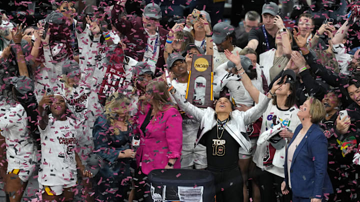South Carolina basketball coach Dawn Staley and her Gamecocks team after winning the 2023-2024 National Championship