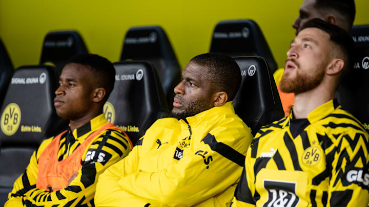 Moukoko, Modeste und Özcan Moukoko, Modeste und Özcan