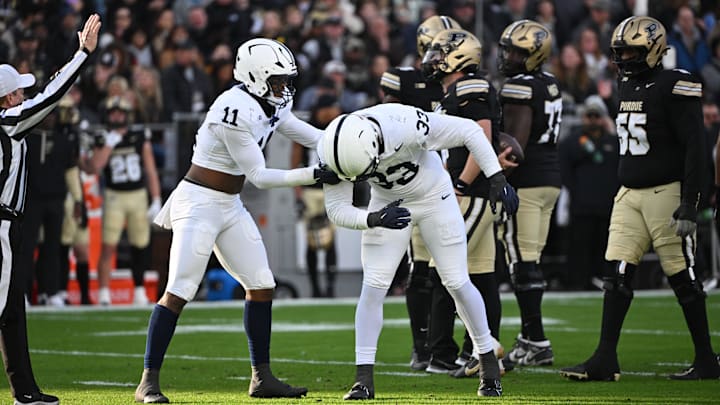 Penn State defensive ends Dani Dennis-Sutton (33) and Abdul Carter (11) celebrate a sack during the first quarter against the Purdue Boilermakers at Ross-Ade Stadium.