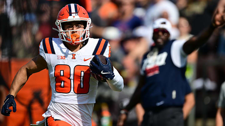 Oct 4, 2025; West Lafayette, Indiana, USA; Illinois Fighting Illini wide receiver Hank Beatty (80) runs the ball down field during the second quarter against the Purdue Boilermakers at Ross-Ade Stadium. Mandatory Credit: Marc Lebryk-Imagn Images Oct 4, 2025; West Lafayette, Indiana, USA; Illinois Fighting Illini wide receiver Hank Beatty (80) runs the ball down field during the second quarter against the Purdue Boilermakers at Ross-Ade Stadium. Mandatory Credit: Marc Lebryk-Imagn Images