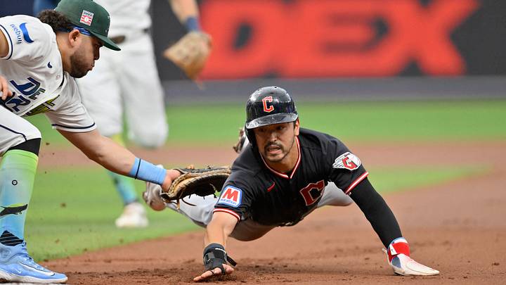 Jul 25, 2026; St. Petersburg, Florida, USA; Cleveland Guardians outfielder Steven Kwan (38) slides to first base as Tampa Bay Rays first baseman Jonathan Aranda (8) tags him out during the first inning at Tropicana Field. Mandatory Credit: Pablo Robles-Imagn Images Jul 25, 2026; St. Petersburg, Florida, USA; Cleveland Guardians outfielder Steven Kwan (38) slides to first base as Tampa Bay Rays first baseman Jonathan Aranda (8) tags him out during the first inning at Tropicana Field. Mandatory Credit: Pablo Robles-Imagn Images
