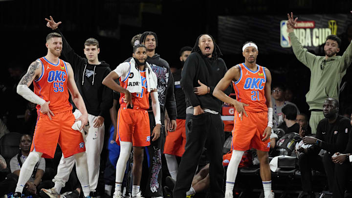 Dec 14, 2024; Las Vegas, Nevada, USA; The Oklahoma City Thunder bench reacts during the fourth quarter against the Houston Rockets in a semifinal of the 2024 Emirates NBA Cup at T-Mobile Arena. Mandatory Credit: Kyle Terada-Imagn Images