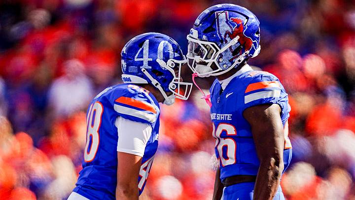 Boise State kicker Canaan Moore, left, celebrates with Sire Gaines. Boise State kicker Canaan Moore, left, celebrates with Sire Gaines.