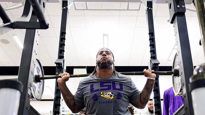 LSU Tigers Offensive Tackle Jordan Seaton Squatting