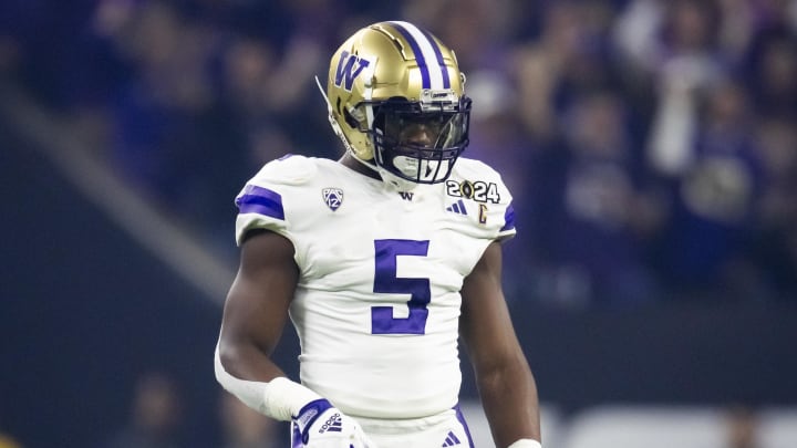 Jan 8, 2024; Houston, TX, USA; Washington Huskies  linebacker Edefuan Ulofoshio (5) against the Michigan Wolverines during the 2024 College Football Playoff national championship game at NRG Stadium. Mandatory Credit: Mark J. Rebilas-USA TODAY Sports