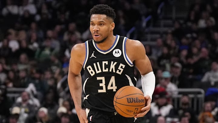 Jan 23, 2026; Milwaukee, Wisconsin, USA;  Milwaukee Bucks forward Giannis Antetokounmpo (34) walks the ball up court during the second quarter against the Denver Nuggets at Fiserv Forum. Mandatory Credit: Jeff Hanisch-Imagn Images