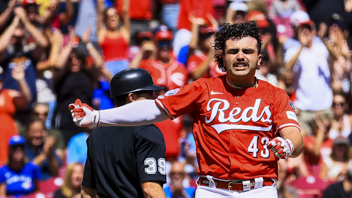 Sep 1, 2025; Cincinnati, Ohio, USA; Cincinnati Reds first baseman Sal Stewart (43) reacts after scoring on a two-run triple hit by third baseman Ke'Bryan Hayes (not pictured) in the second inning against the Toronto Blue Jays at Great American Ball Park. Mandatory Credit: Katie Stratman-Imagn Images Sep 1, 2025; Cincinnati, Ohio, USA; Cincinnati Reds first baseman Sal Stewart (43) reacts after scoring on a two-run triple hit by third baseman Ke'Bryan Hayes (not pictured) in the second inning against the Toronto Blue Jays at Great American Ball Park. Mandatory Credit: Katie Stratman-Imagn Images