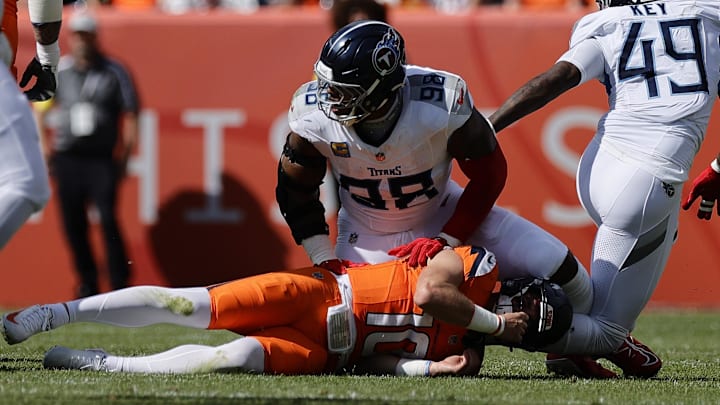 Tennessee Titans defensive tackle Jeffery Simmons sacks Denver Broncos quarterback Bo Nix at Empower Field at Mile High. Tennessee Titans defensive tackle Jeffery Simmons sacks Denver Broncos quarterback Bo Nix at Empower Field at Mile High.