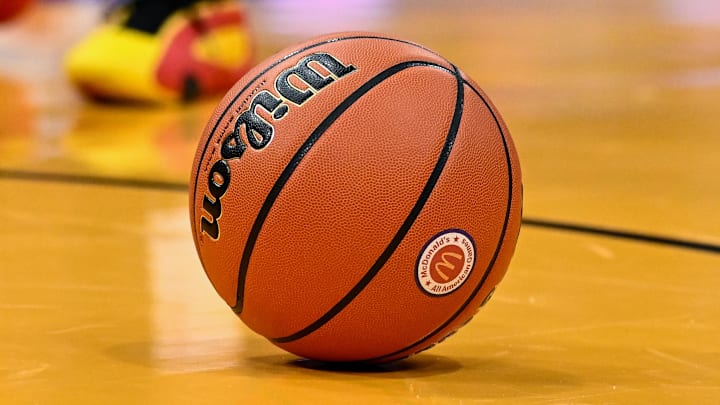 Apr 2, 2024; Houston, TX, USA; A detailed view of the McDonald's All American logo on a basketball during the game between the McDonald's All American East and the McDonald's All American West at Toyota Center. Mandatory Credit: Maria Lysaker-Imagn Images