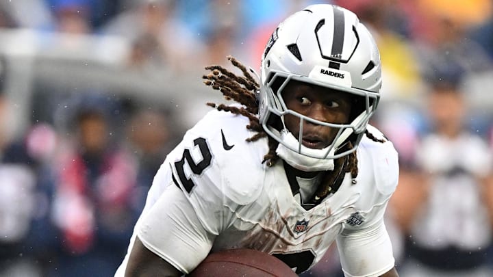Sep 7, 2025; Foxborough, Massachusetts, USA; Las Vegas Raiders running back Ashton Jeanty (2) rushes the ball against the New England Patriots during the second half at Gillette Stadium. Mandatory Credit: Brian Fluharty-Imagn Images Sep 7, 2025; Foxborough, Massachusetts, USA; Las Vegas Raiders running back Ashton Jeanty (2) rushes the ball against the New England Patriots during the second half at Gillette Stadium. Mandatory Credit: Brian Fluharty-Imagn Images