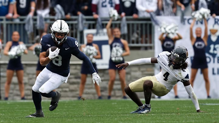 Penn State Nittany Lions wide receiver Trebor Peña (8) runs with the ball after breaking a tackle vs. the FIU Panthers at Beaver Stadium. 