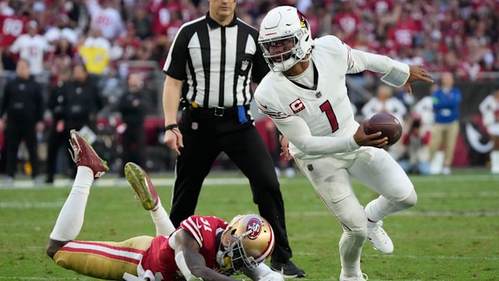 Dec 17, 2023; Glendale, Ariz, United States; Arizona Cardinals quarterback Kyler Murray (1) escapes