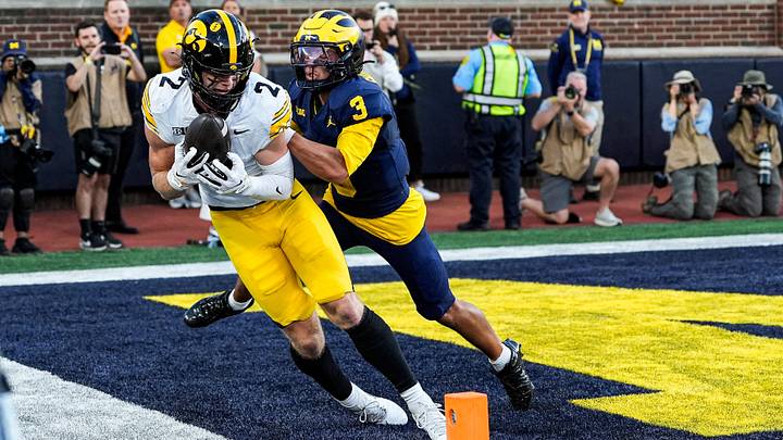 Iowa wide receiver Reece Vander Zee (2) makes a catch for a touchdown against Michigan cornerback Smith Snowden (3) during the second half at Michigan Stadium in Ann Arbor on Saturday, Sept. 26, 2026. Iowa wide receiver Reece Vander Zee (2) makes a catch for a touchdown against Michigan cornerback Smith Snowden (3) during the second half at Michigan Stadium in Ann Arbor on Saturday, Sept. 26, 2026.