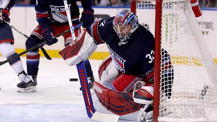 Mar 9, 2025; New York, New York, USA; New York Rangers goaltender Jonathan Quick (32) plays the puck against the Columbus Blue Jackets during the first period at Madison Square Garden. Mandatory Credit: Brad Penner-Imagn Images