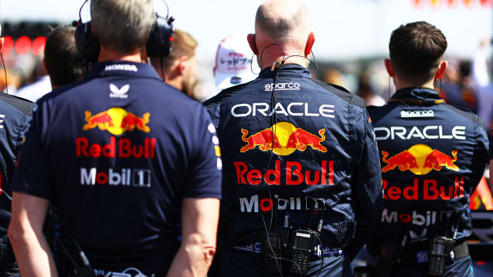 The Oracle Red Bull Racing team stand for the Japanese national anthem on the grid prior to the F1 Grand Prix of Japan at Suzuka International Racing Course on April 07, 2024 in Suzuka, Japan. (Photo by Mark Thompson/Getty Images)
