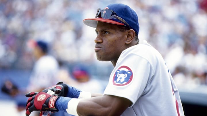 Unknown date and location, USA; FILE PHOTO; Chicago Cubs right fielder Sammy Sosa in the dugout at an unknown location. 