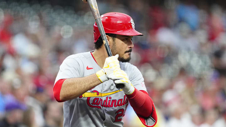 Jul 22, 2025; Denver, Colorado, USA; St. Louis Cardinals third baseman Nolan Arenado (28) on deck in the first inning against the Colorado Rockies at Coors Field. Mandatory Credit: Ron Chenoy-Imagn Images