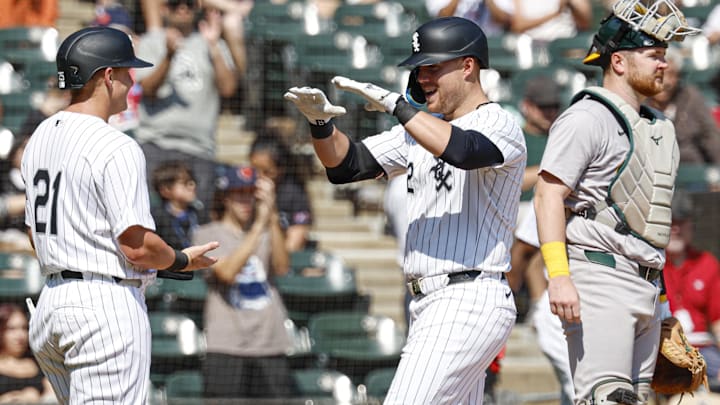 Sep 15, 2024; Chicago, Illinois, USA; Chicago White Sox outfielder Gavin Sheets (32) celebrates with first baseman Andrew Vaughn (21) after hitting a two-run home run against the Oakland Athletics during the first inning at Guaranteed Rate Field. Mandatory Credit: Kamil Krzaczynski-Imagn Images