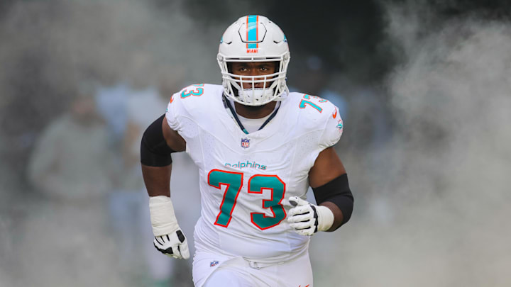 Miami Dolphins tackle Austin Jackson (73) enters the field to take on the New York Jets at Hard Rock Stadium in 2023.