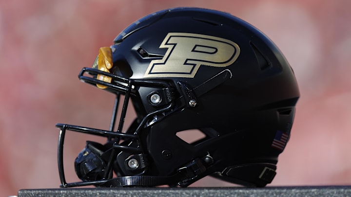 A Purdue Boilermakers helmet sits on the sidelines during the game against the Wisconsin Badgers