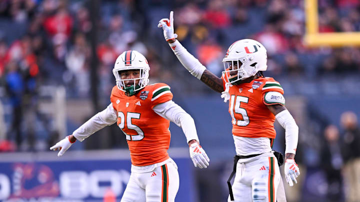 Dec 28, 2023; Bronx, NY, USA; Miami Hurricanes defensive back Markeith Williams (15) and Miami Hurricanes defensive back Jadais Richard (25) react to a missed field goal by Rutgers Scarlet Knights during the second quarter at Yankee Stadium. Mandatory Credit: Mark Smith-Imagn Images