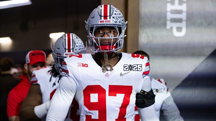 Jan 20, 2025; Atlanta, GA, USA; Ohio State Buckeyes defensive end Kenyatta Jackson Jr. (97) against the Notre Dame Fighting Irish during the CFP National Championship college football game at Mercedes-Benz Stadium. Mandatory Credit: Mark J. Rebilas-Imagn Images
