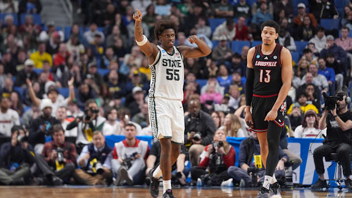 Mar 21, 2026; Buffalo, NY, USA; Michigan State Spartans forward Coen Carr (55) reacts after defeating the Louisville Cardinals during a second round game of the men's 2026 NCAA Tournament at Keybank Center. Mandatory Credit: Gregory Fisher-Imagn Images