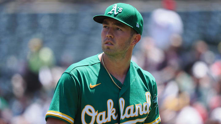 Jul 19, 2023; Oakland, California, USA; Oakland Athletics starting pitcher Ken Waldichuk (64) returns to the dugout after the top of the first inning against the Boston Red Sox at Oakland-Alameda County Coliseum. Mandatory Credit: Kelley L Cox-Imagn Images
