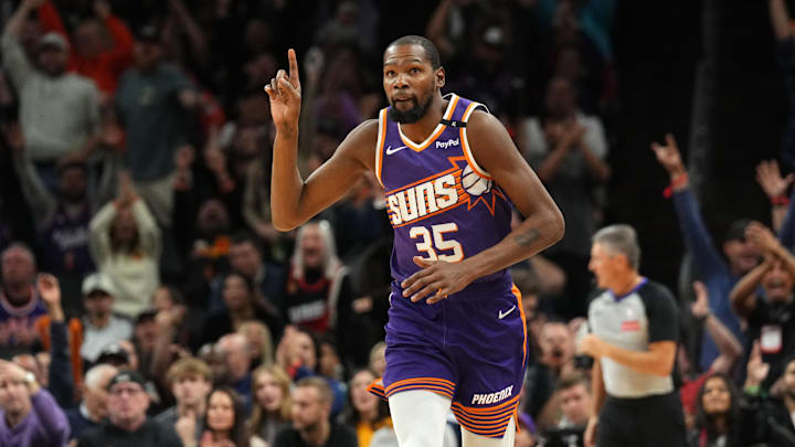 Nov 6, 2024; Phoenix, Arizona, USA; Phoenix Suns forward Kevin Durant (35) celebrates a basket against the Miami Heat during the second half at Footprint Center. Mandatory Credit: Joe Camporeale-Imagn Images