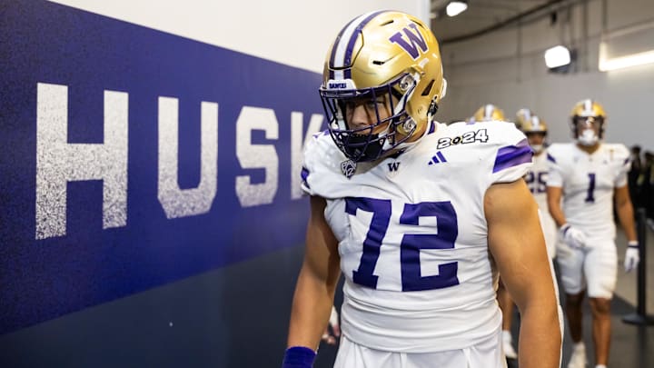 Jan 8, 2024; Houston, TX, USA; Washington Huskies offensive lineman Parker Brailsford (72) against