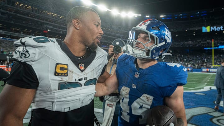 New York Giants running back Cam Skattebo (44) and Philadelphia Eagles running back Saquon Barkley (26) talk after a Thursday Night Football game between the New York Giants and the Philadelphia Eagles at MetLife Stadium in East Rutherford on Oct. 9, 2025.