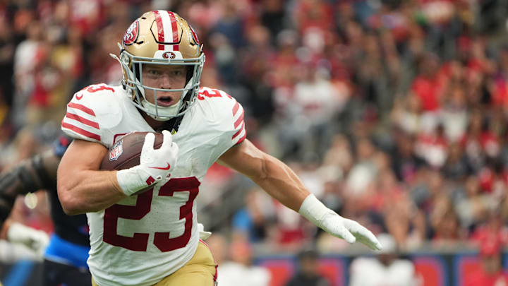 Oct 26, 2025; Houston, Texas, USA; San Francisco 49ers running back Christian McCaffrey (23) runs for a gain during the second half against the Houston Texans at NRG Stadium. Mandatory Credit: Sean Thomas-Imagn Images