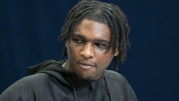 Feb 28, 2025; Indianapolis, IN, USA;Miami quarterback Cam Ward (QB15) talks to the press during the 2025 NFL Combine at Indiana Convention Center. Mandatory Credit: Stephanie Amador Blondet-Imagn Images
