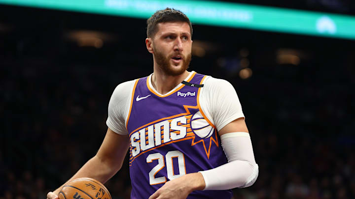 Dec 27, 2024; Phoenix, Arizona, USA; Phoenix Suns center Jusuf Nurkic (20) against the Dallas Mavericks at Footprint Center. Mandatory Credit: Mark J. Rebilas-Imagn Images